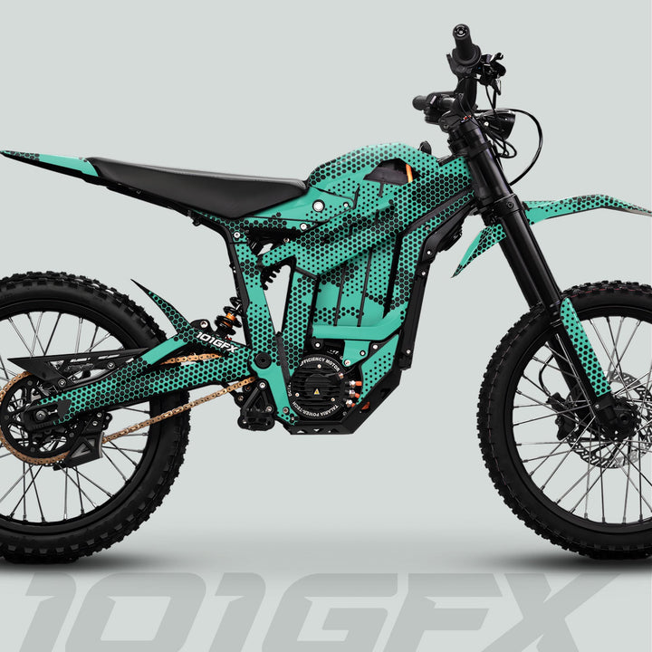 Talaria Sting MX5 PRO Graphics Kit HEXOCAM MINT Decals on an electric dirt bike, featuring a teal-and-black honeycomb design, enhancing style and durability.