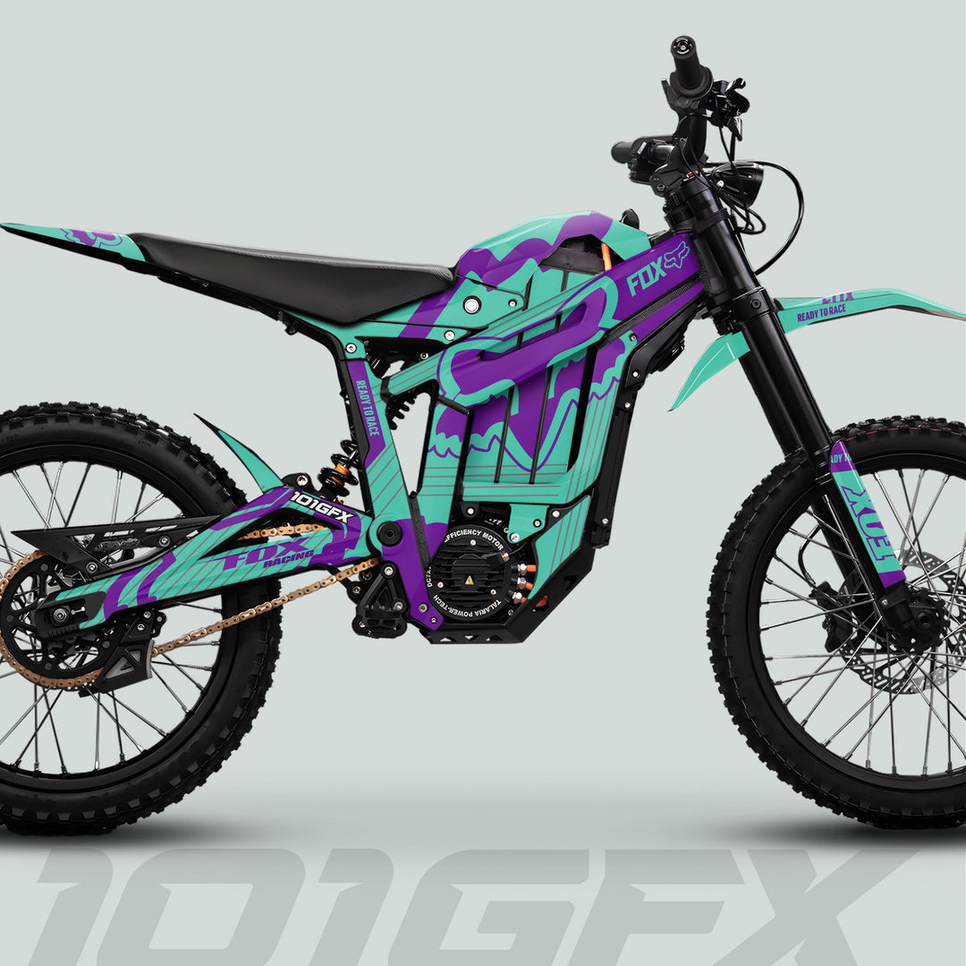 Talaria Sting MX5 PRO with FOX STRIPES Mint Purple Decals on electric dirt-bike, featuring full suspension, knobby tires, and striking graphics for enhanced style.