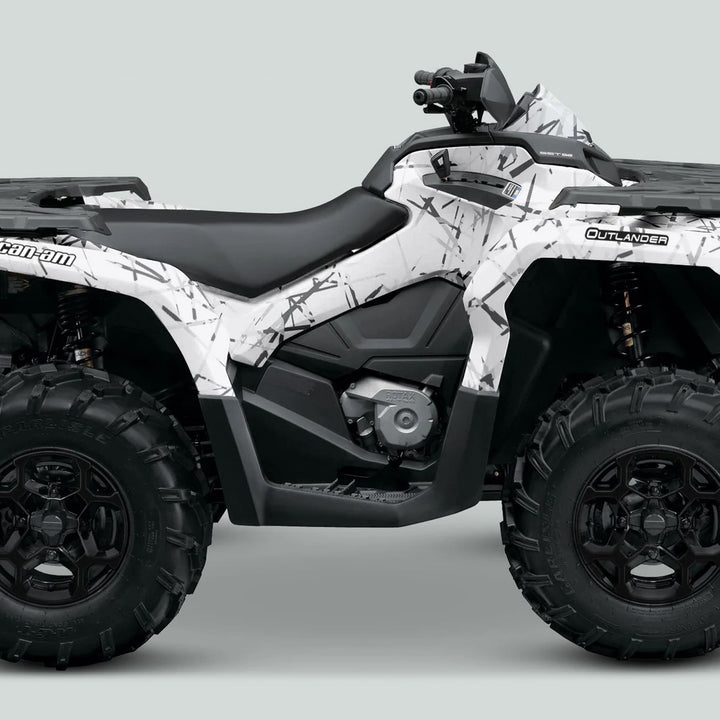 Can-Am OUTLANDER G2 Graphics Kit SCRATCHY WINTER on an ATV, showcasing off-road tires and handlebar controls, enhancing style and durability with weather-resistant decals.