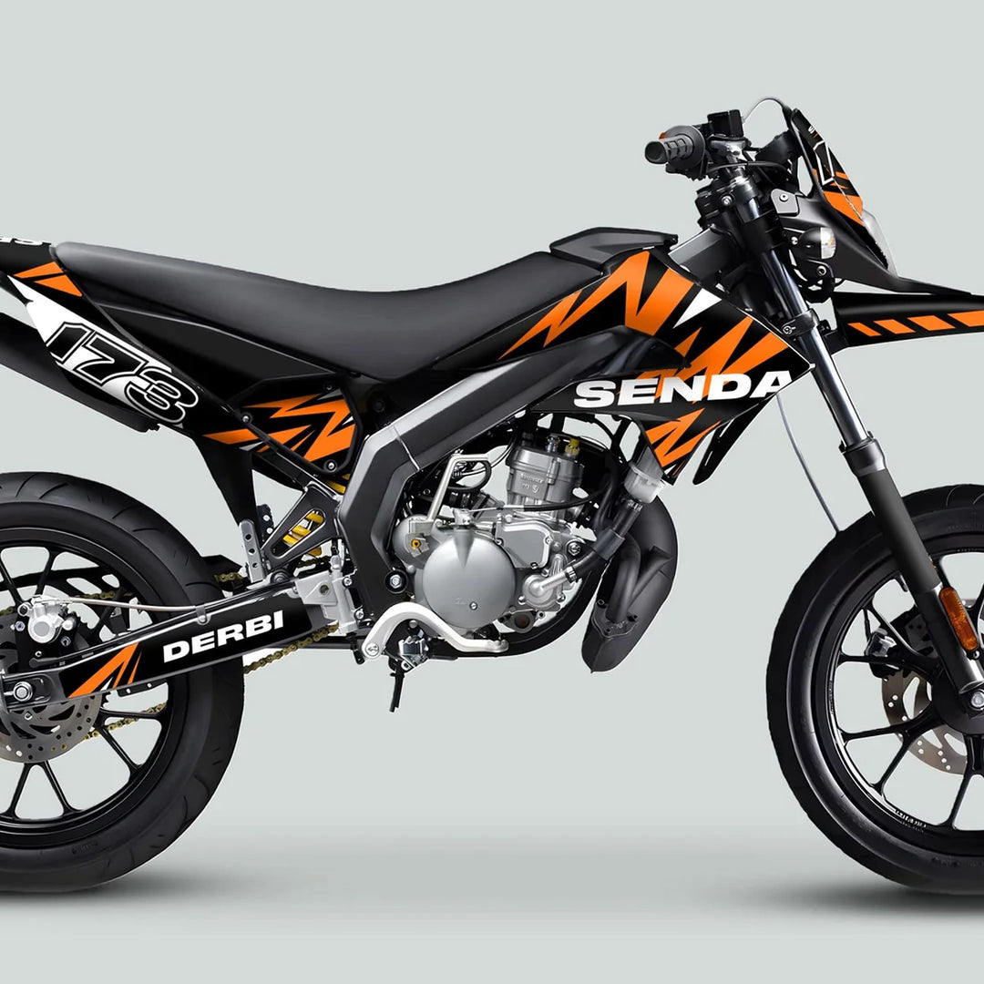 Side view of Derbi Senda motorcycle showcasing the Graphics Kit X-Treme 2011-2017 in Lightning Black and Orange, featuring vibrant decals and durable vinyl material.