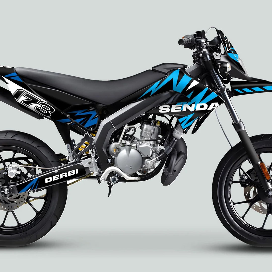 Derbi Senda Graphics Kit X-Treme 2011-2017 LIGHTNING BLUE CYAN on a black supermoto motorcycle, showcasing spoked wheels, disc brakes, and flat seat.