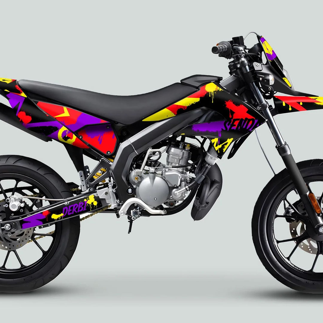 Derbi Senda Graphics Kit X-Treme 2011-2017 SPLASH PURPLE RED on matte black moped, showcasing vibrant splatter design on tank and fenders.