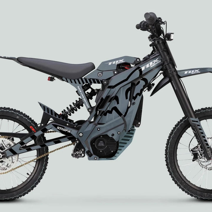 Side profile of E Ride Pro SS Graphics Kit FOX Race Line Grey Black on an electric dirt bike featuring Fox Racing branding and durable decals.