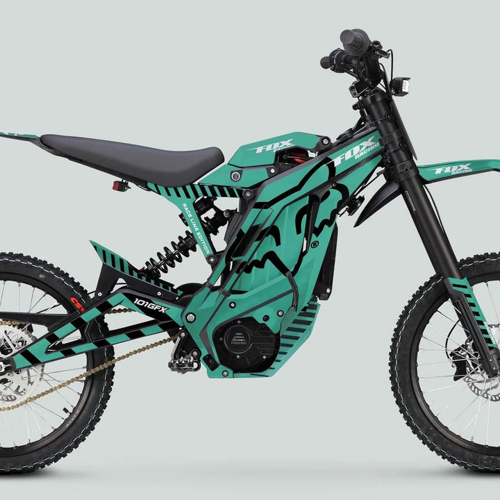 E Ride Pro SS Graphics Kit on a teal-green off-road electric dirt bike, featuring FOX Race Line Mint Black design with durable, stylish decals.