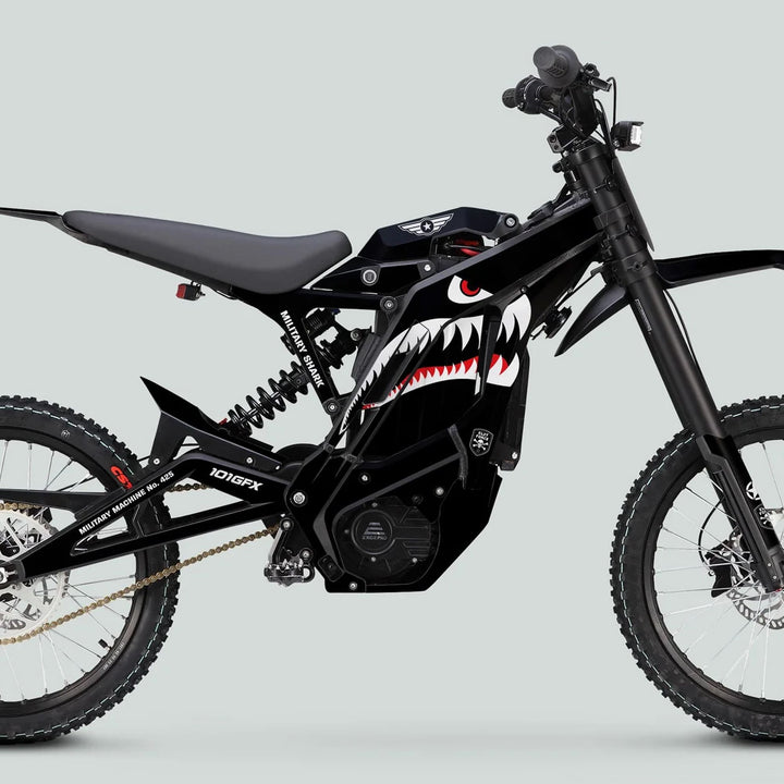 Black off-road electric bike featuring E Ride Pro SS Graphics Kit MILITARY SHARK, showcasing a shark mouth design on a motocross-inspired frame.