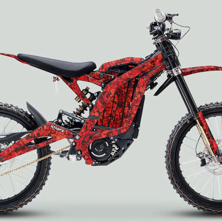 Side-profile of an off-road electric dirt-bike featuring the Surron Light Bee X Graphics Kit SQUARE TEK Red with red digital-camo wrap and durable, glossy laminated finish.