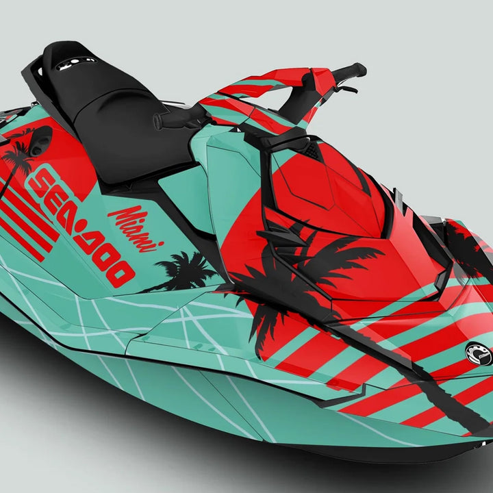 Sea Doo Spark Graphics Kit MIAMI MINT RED on a Sea-Doo, featuring teal and red diagonal stripes, palm trees, and Miami script for a stylish, protective finish.