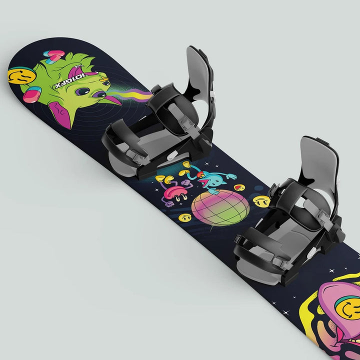 Snowboard with Snowboard Wrap ACID, featuring vibrant cartoon-style graphics with a green cat, aliens, and space-themed doodles, complete with black strap-in bindings.
