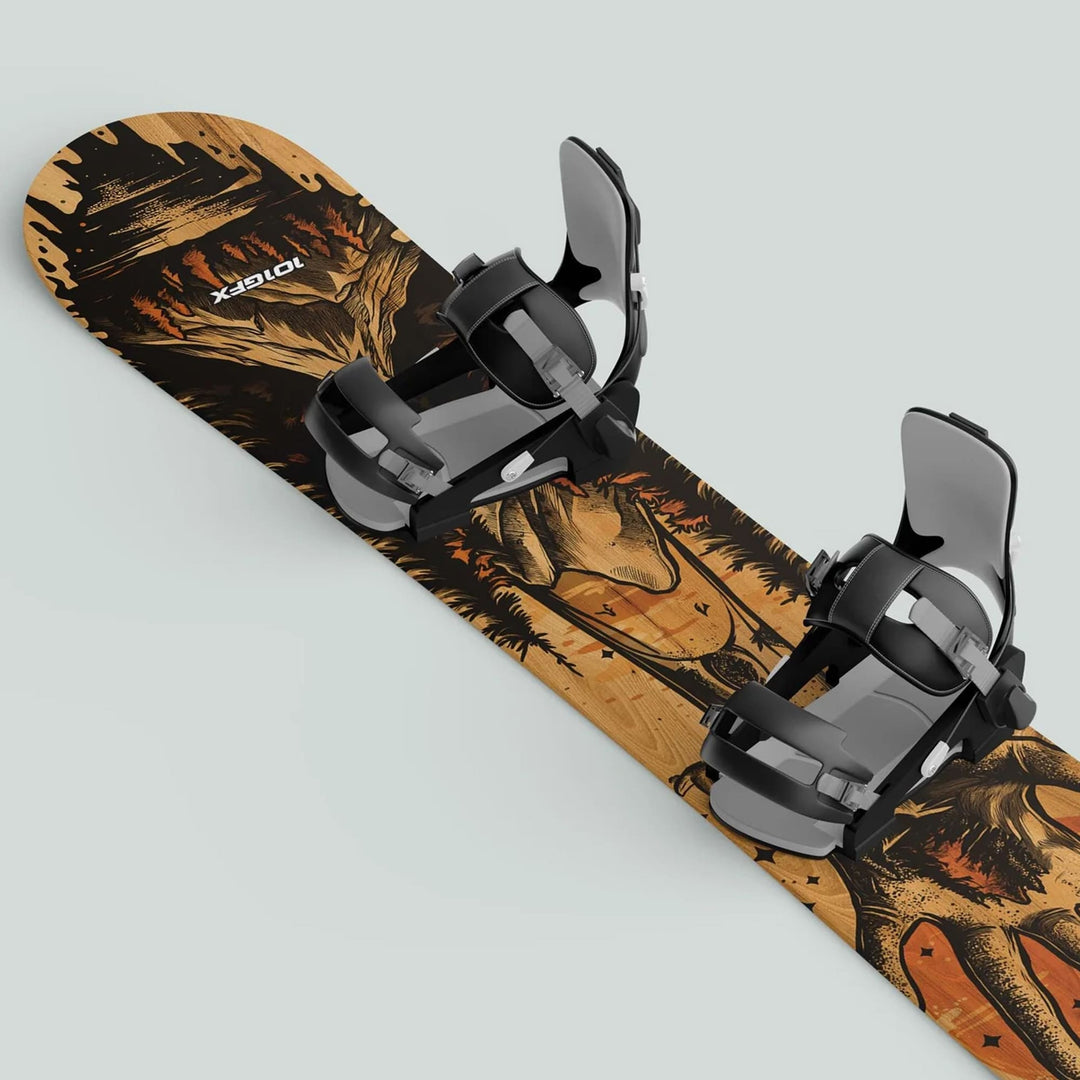 Snowboard with black bindings featuring the Snowboard Wrap HELLO MOUNTAINS, showcasing wood-grain graphics with mountain and animal/skull artwork, plus a TOPEX logo.