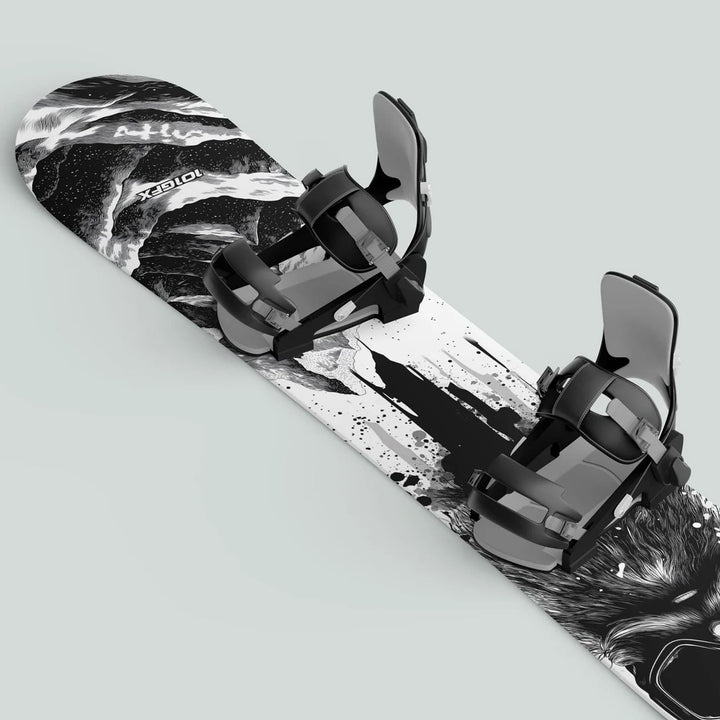 Snowboard with Snowboard Wrap SNOWER WHITE BLACK featuring black-and-white graphic, animal motif, and black bindings, showcasing customization and protection for winter sports enthusiasts.