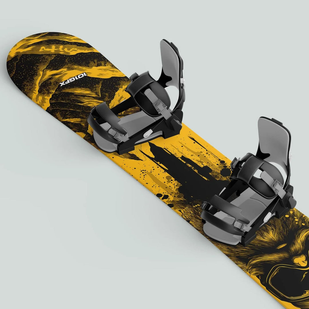 Snowboard Wrap SNOWER YELLOW: freestyle snowboard with striking yellow-and-black graphic, stylized lion head, and black-and-grey bindings, enhancing style and protection.