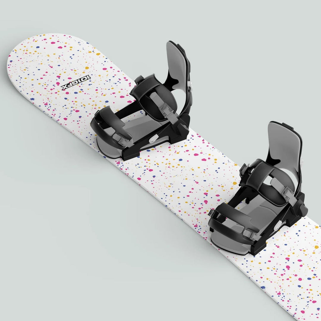 Snowboard with Snowboard Wrap SPLATS WHITE, featuring colorful splatters, and black-and-gray bindings, showcasing a stylish, protective decal for winter sports enthusiasts.