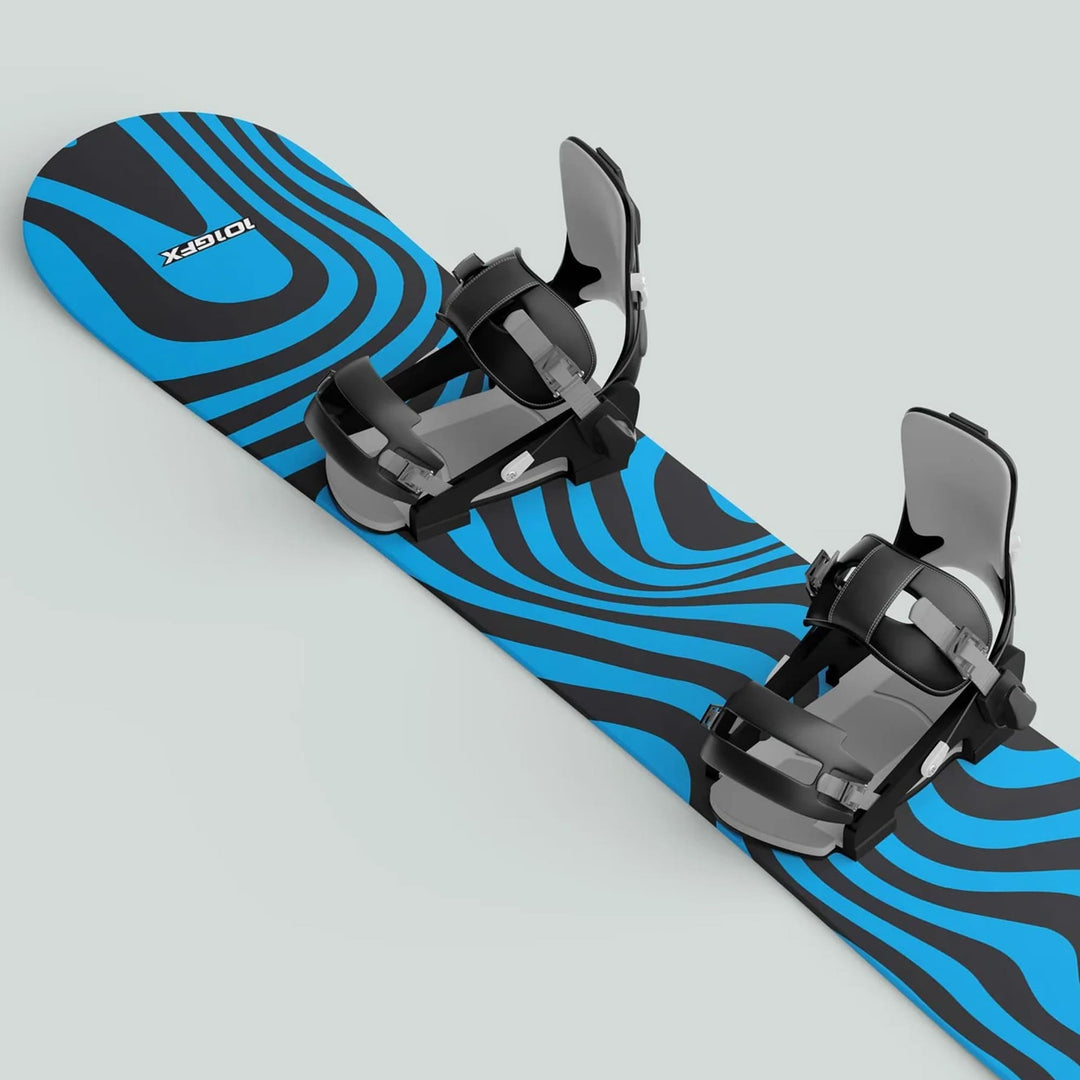 Snowboard with black and bright blue wavy striped graphic, featuring mounted adjustable bindings. Highlights Snowboard Wrap WAVY CYAN BLACK sticker decals for style and protection.