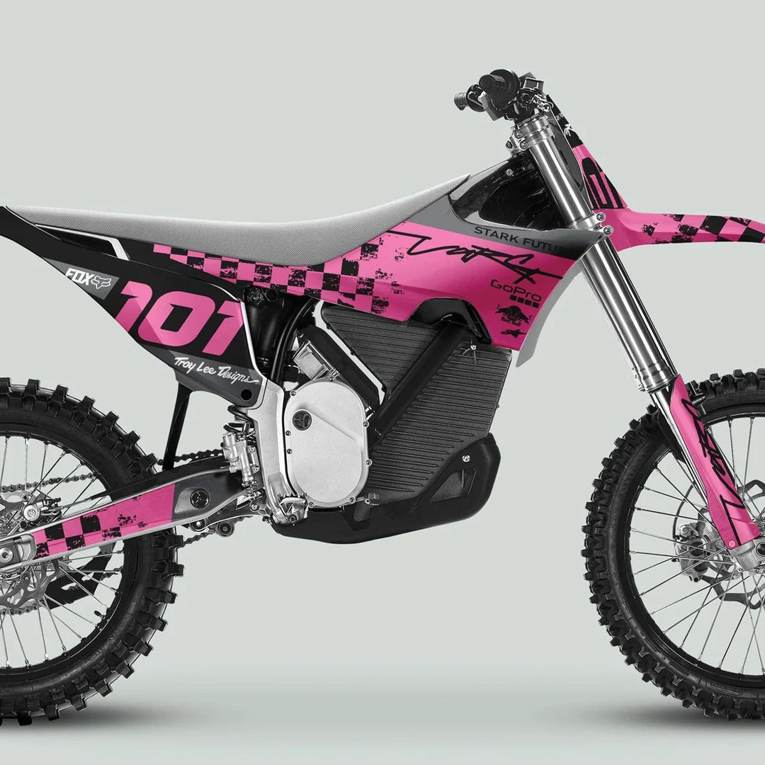 Side-profile of Stark Varg Graphics Kit RACE BLACK Pink Decals Stickers on an electric dirt bike, featuring a checkerboard theme with branding details.