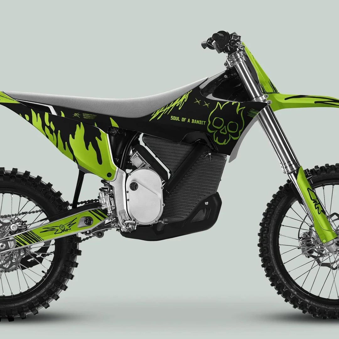 Stark Varg Graphics Kit SOUL FLAME Black Green Decals on an electric dirt bike, featuring neon-green flames and a stylized flaming skull logo.
