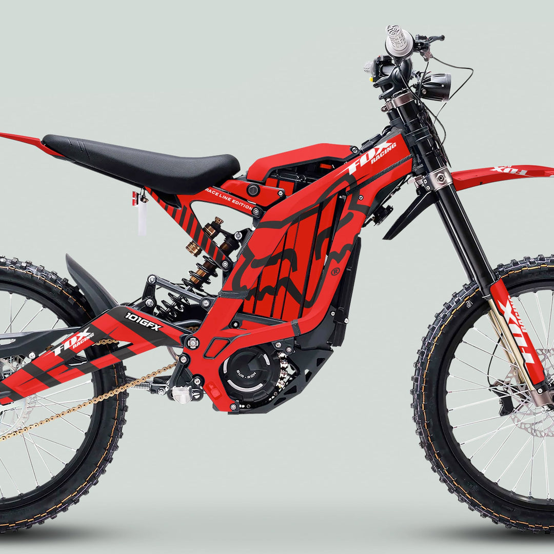 Surron Light Bee X Graphics Kit FOX RACE LINE Red Black on an electric off-road bike, showcasing durable, stylish Fox Racing decals for a personalized, protective upgrade.