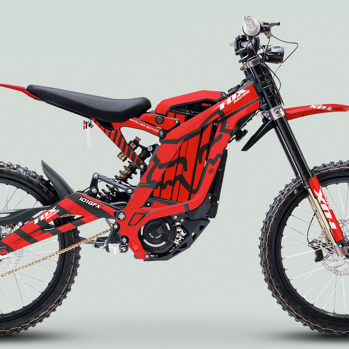 Surron Light Bee X Graphics Kit FOX RACE LINE Red Black on an electric off-road bike, showcasing durable, stylish Fox Racing decals for a personalized, protective upgrade.