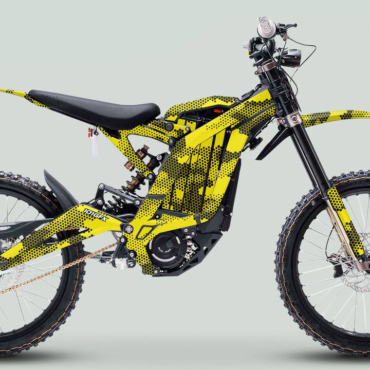 Surron Light Bee X Graphics Kit HEXOCAM Yellow on a yellow-and-black electric off-road motorcycle, showcasing a custom-fit, durable, camouflage design with easy installation and weather resistance.
