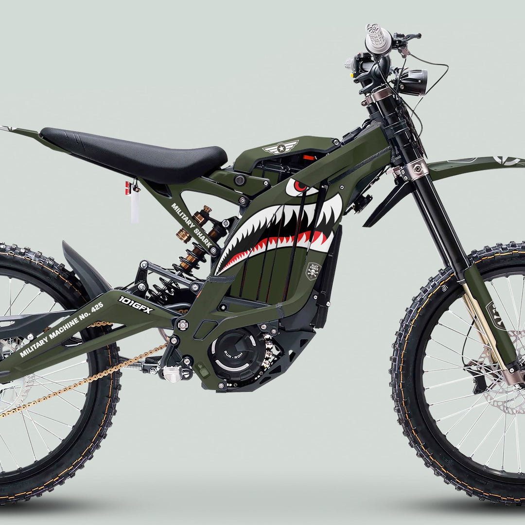 Surron Light Bee X Graphics Kit MILITARY SHARK Olive on electric dirt bike with olive drab finish, shark mouth graphic, and military-themed decals.