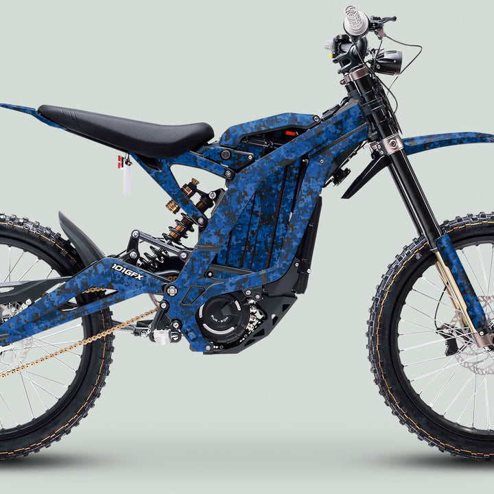 Surron Light Bee X Graphics Kit SQUARE TEK Blue on a digital blue-camo e-bike, showcasing glossy stickers enhancing aesthetics and protection with easy application and custom fit.