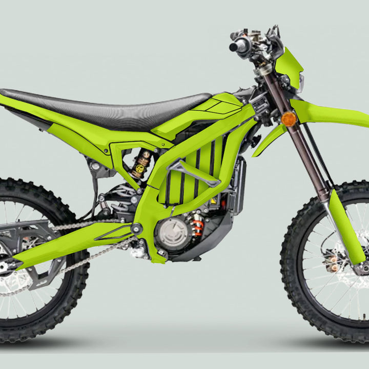 Electric dirt bike with Surron Ultra Bee Graphics Kit in solid color green, featuring knobby tires, spoked wheels, and a carbon-look seat for enhanced style.
