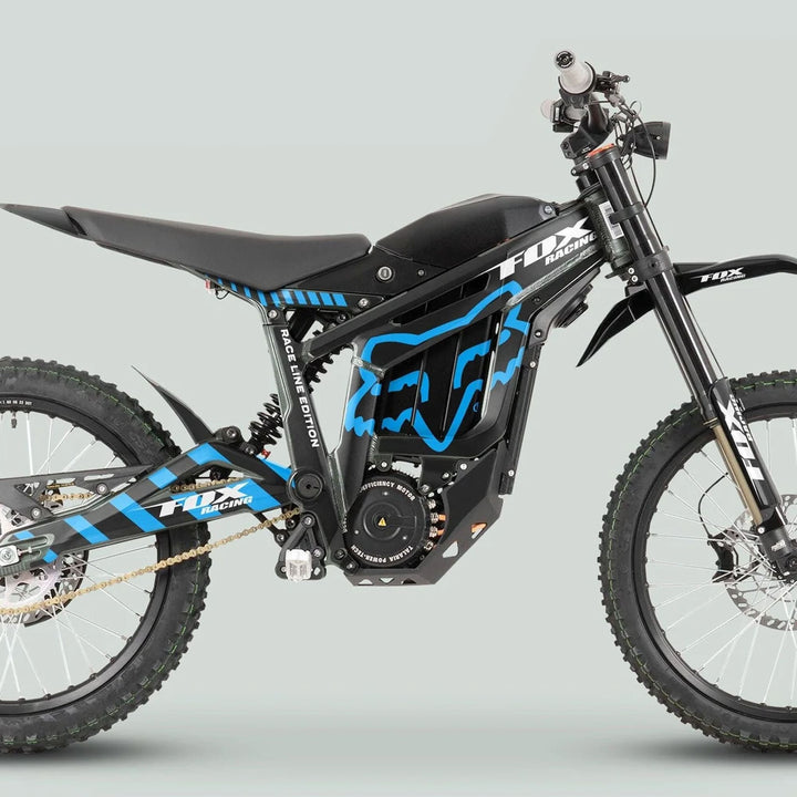 Talaria Sting MX3 MX4 Graphics Kit FOX Raceline Black Blue on electric off-road bike, highlighting frame, suspension, and Fox Racing branding on battery and swingarm.