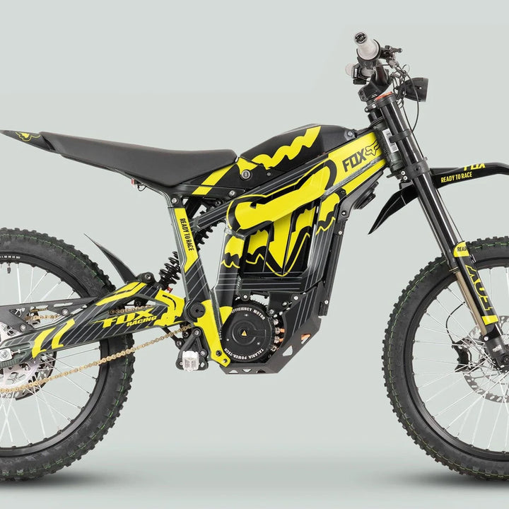 Side view of Talaria Sting MX3 MX4 Graphics Kit FOX STRIPES Black Yellow on an electric dirt bike, showcasing sleek black-yellow design and durable decals.