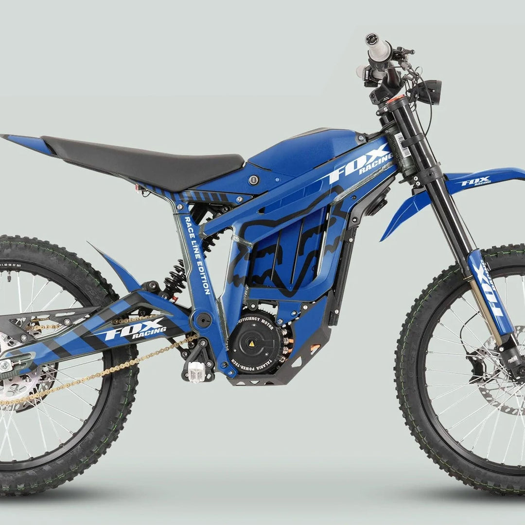 Side profile of the Talaria Sting MX3 MX4 Graphics Kit FOX Raceline Blue Black on an electric dirt bike, highlighting its sleek, custom fit.