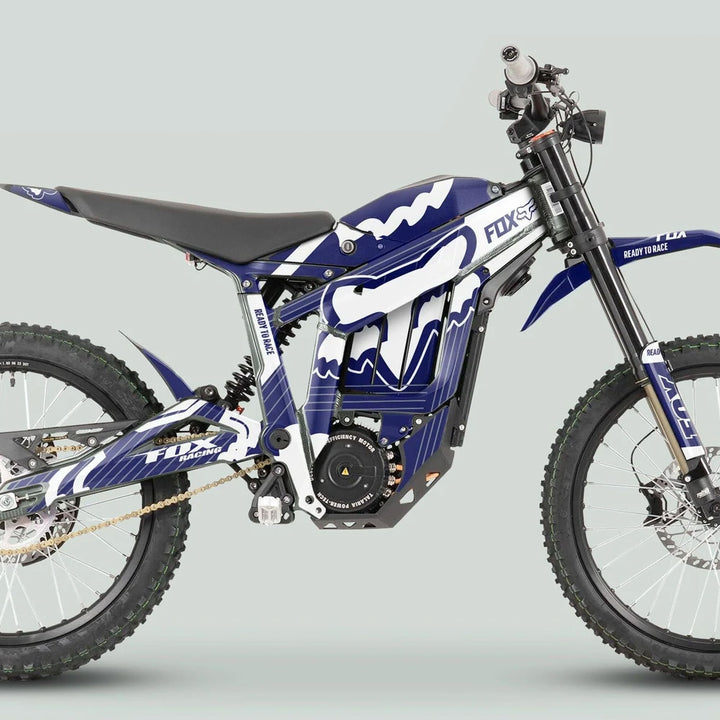 Talaria Sting MX3 MX4 Graphics Kit FOX STRIPES Navy White on an electric dirt bike, featuring vibrant navy-white stripes, knobby tires, and high-clearance suspension for motocross.