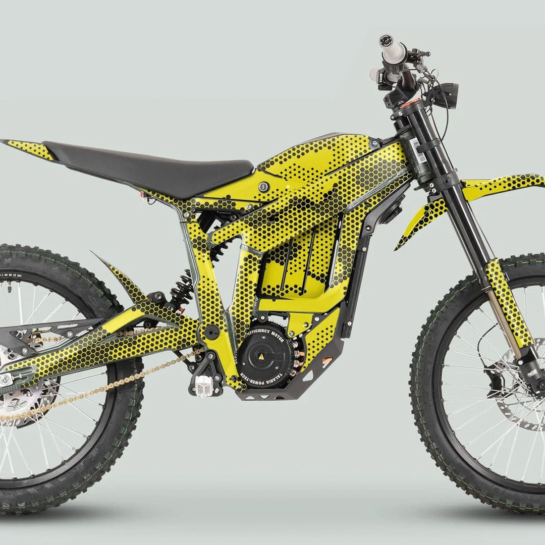 Side profile of Talaria Sting MX3 MX4 Graphics Kit HEXOCAM Yellow on an electric off-road bike, showcasing enhanced aesthetics with vibrant decals and durable, weather-resistant design.
