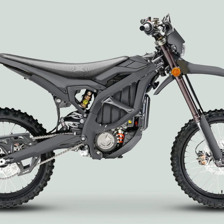 Surron Ultra Bee Graphics Kit SOLID COLOR GREY on electric dirt-bike, highlighting tubular frame, knobby wheels, and battery/motor area for a sleek, modern look.